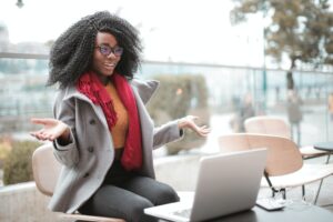 Photo of a Black woman who is receiving individual therapy at Unload It Therapy in Houston, Tx. Visit us today to start seeing how therapy can fit into your schedule. 