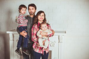 Photo of family in sync after receiving family therapy at Unload It Therapy in Houston, TX. Our therapists provide world class family counseling informed by widely research therapy models in order to help families renew and restore their relationships