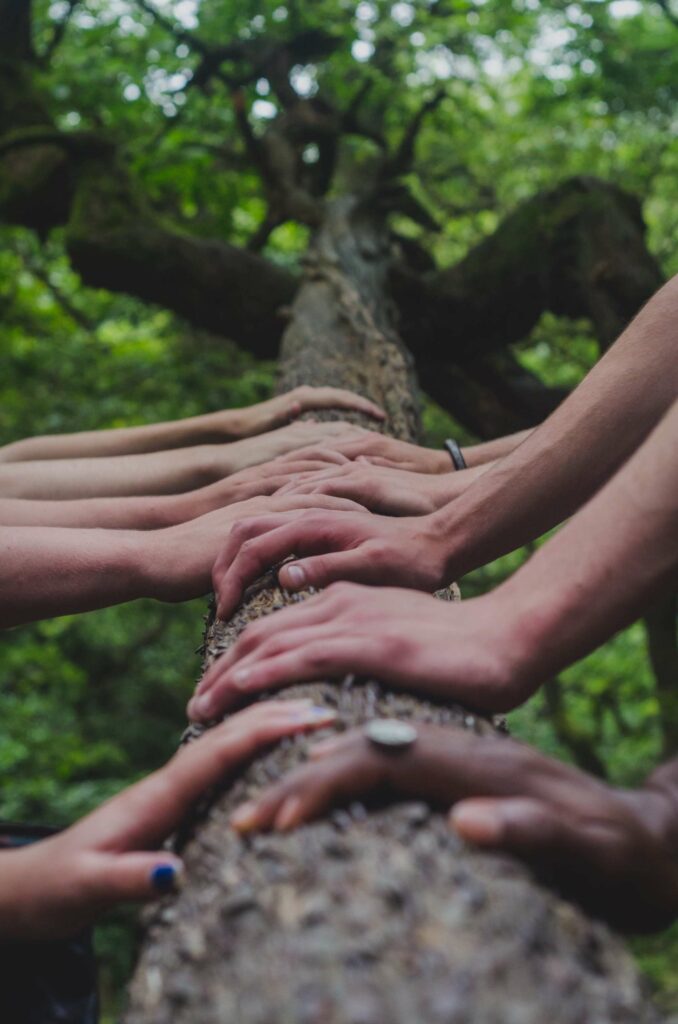 Picture of hands demonstrating community that happens in Houston, and at Unload It Therapy. We cultivate community within our practice and with our clients to help them heal from issues related to grief
